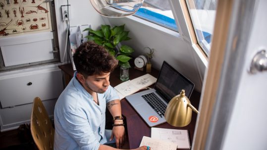 Man sitting at a desk working