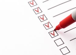 Request Cancer Educational Materials - A checklist marked up with a red pen