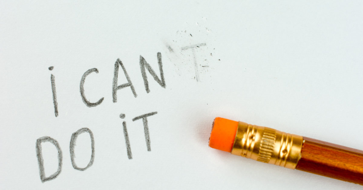 The words "I can do it." The t on "can't" has been erased and a pencil sits next to it.