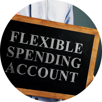 Flexible spending account is typed onto a black chalkboard