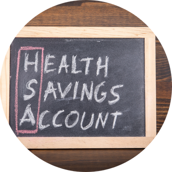 Health savings account is written on a black chalkboard