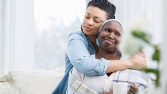Two women hugging