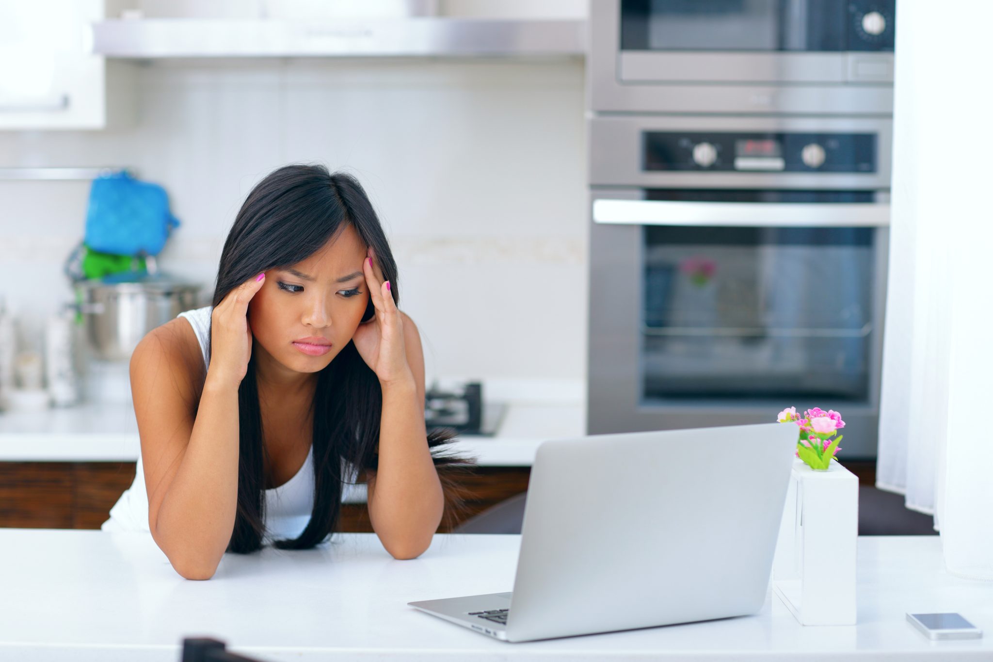 Self-employed freelancer working from home on laptop